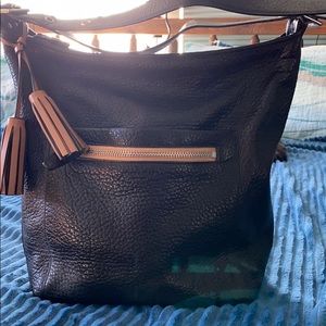 COACH Duffle. Black with brown accent and tassels